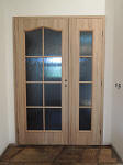 Interiérové dveře a obložková zárubeň, Dvoukřídlé dveře Klasik K14 , přírodní dýha Dub, sklo kůra čirá